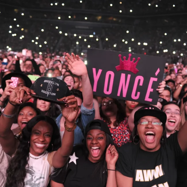 a group of Beyoncé fans at a concert