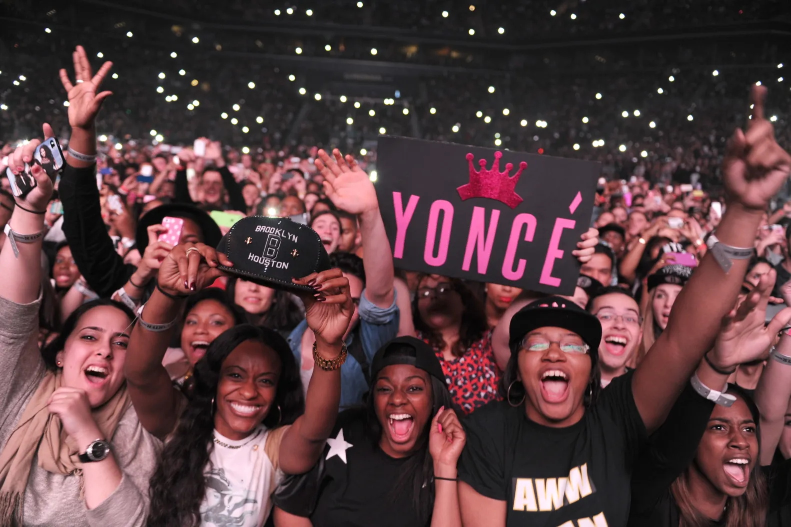 a group of Beyoncé fans at a concert